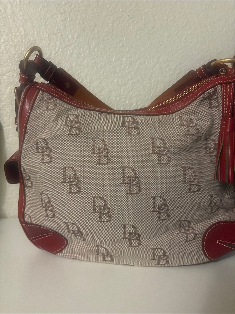 Dooney & Bourke Beige Logo Canvas Hobo with Red Trim